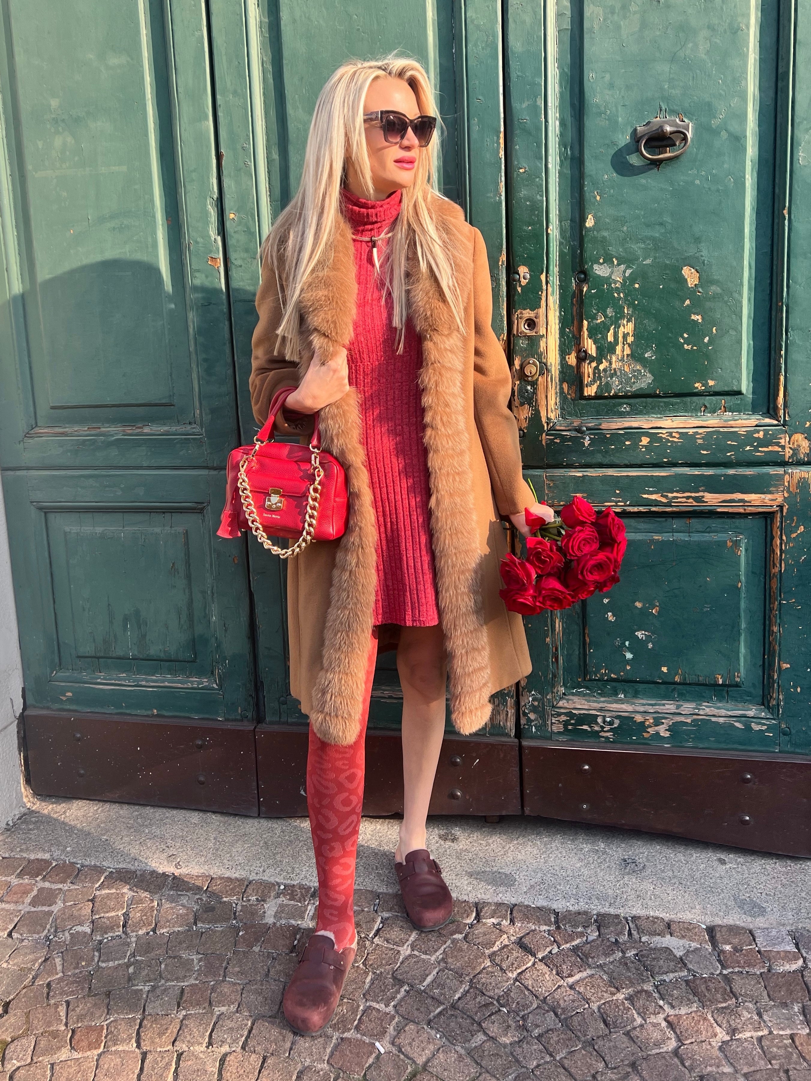 Anna Maisetti showing off her compression stocking for her lymphedema