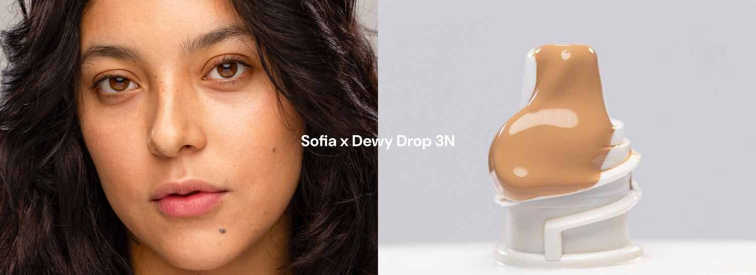 Woman with medium neutral skin wearing Lebubè Dewy Drop hydrating skin tint SPF 30 in shade 3N, showcasing sheer, lightweight texture