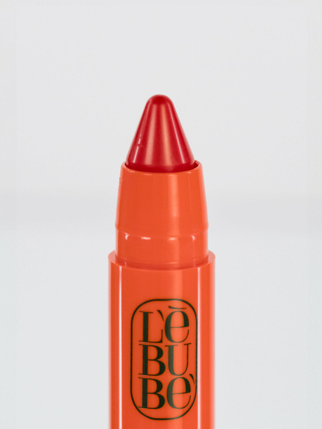 Lebubè Lip and Cheek: zoomed-in front view of Fiery Red shade. 2 in 1 Halal, vegan and natural blush and lipstick.