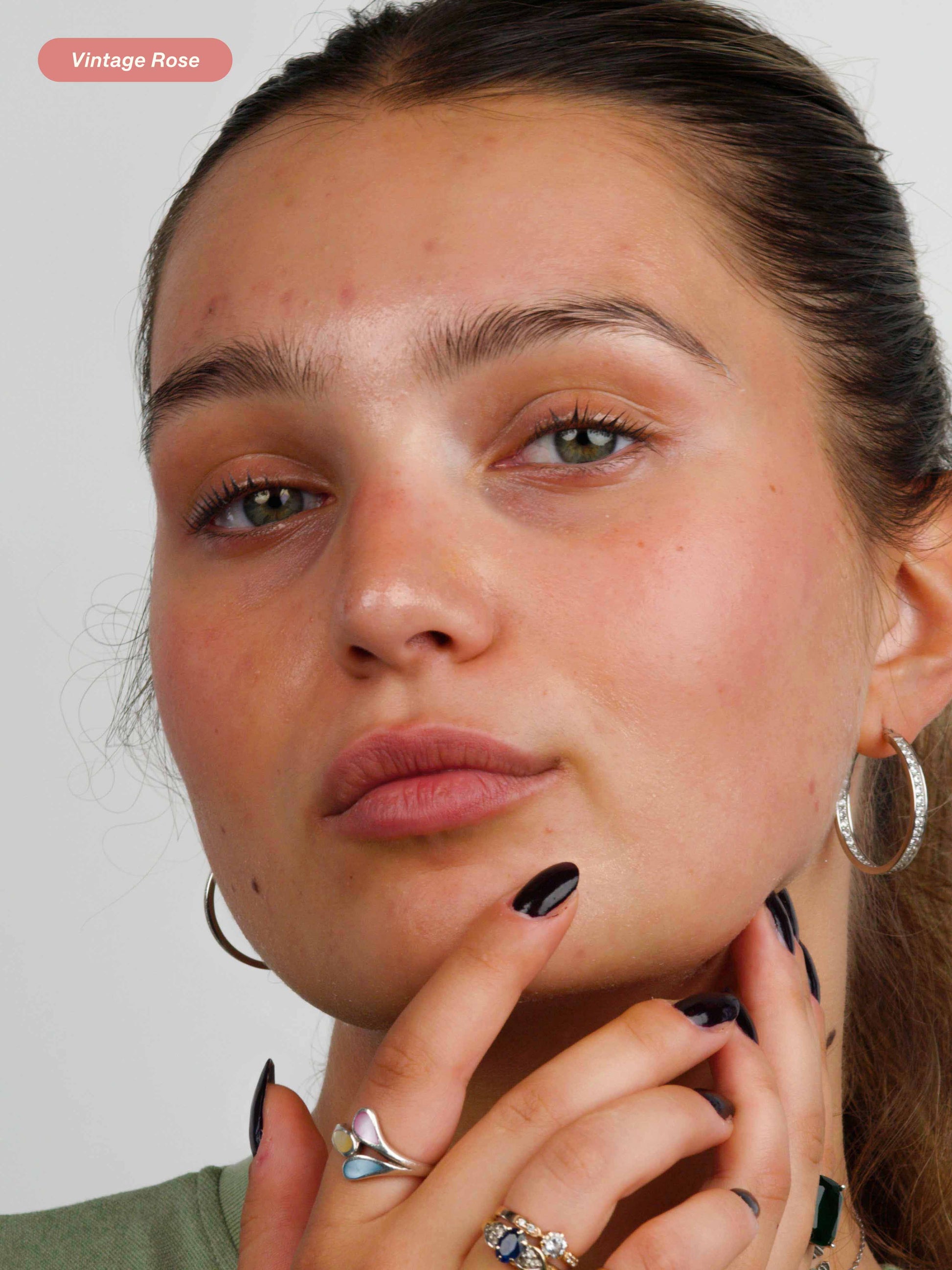 Woman wearing the 2 in 1 Lebubè Lip and Cheek in Vintage Rose: Halal, natural and vegan 2 in 1 blush and lipstick.