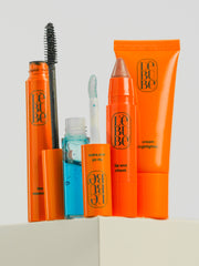 4 Lebubè hybrid cosmetics part of the full face makeup set: Lip and Cheek, lip oil and balm, volumizing mascara, highlighter