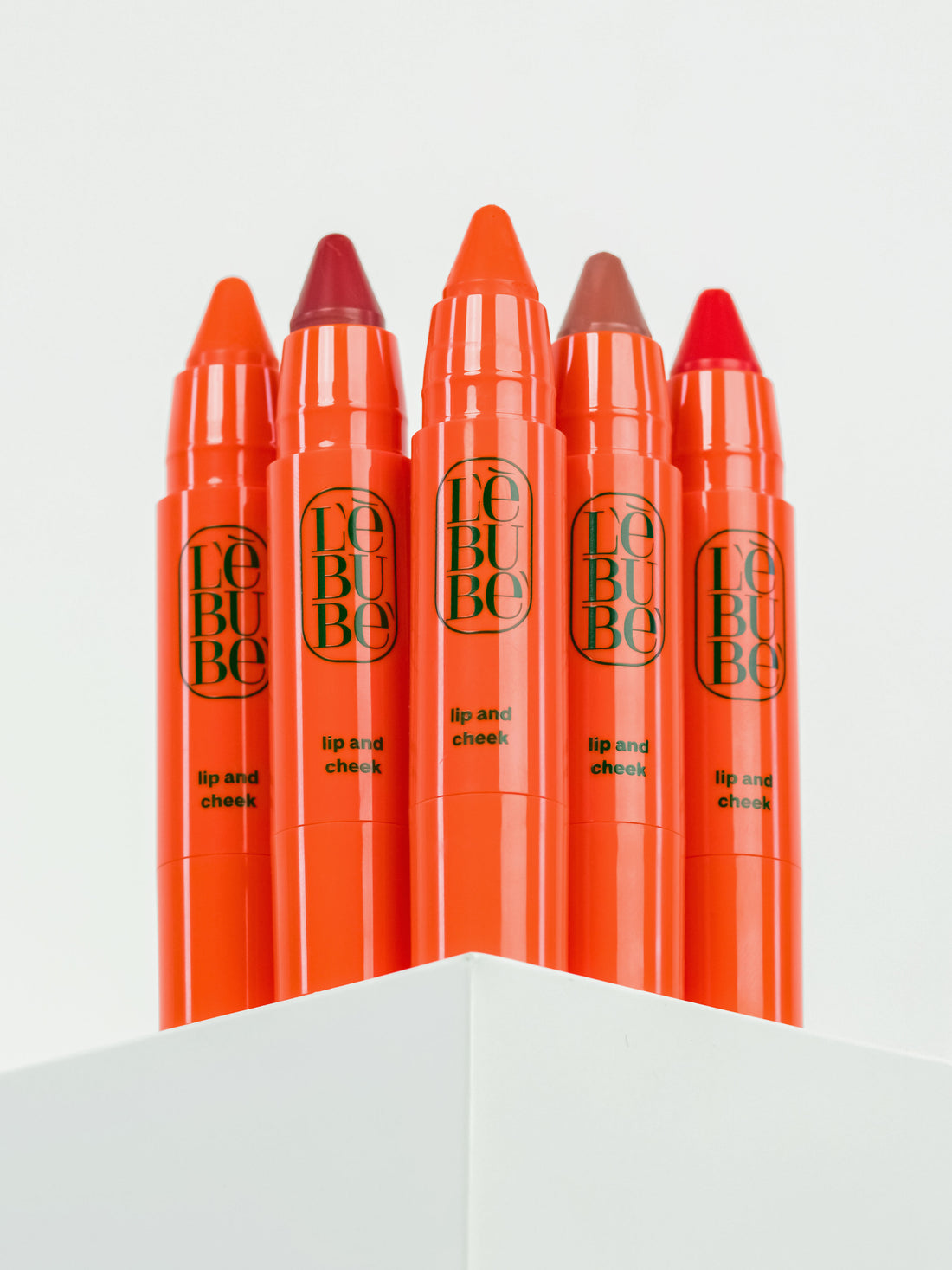 Five Lip and Cheeks in four inclusive shades: vegan, Halal, natural 2 in 1 blush and lipstick, from Lebubè hybrid cosmetics