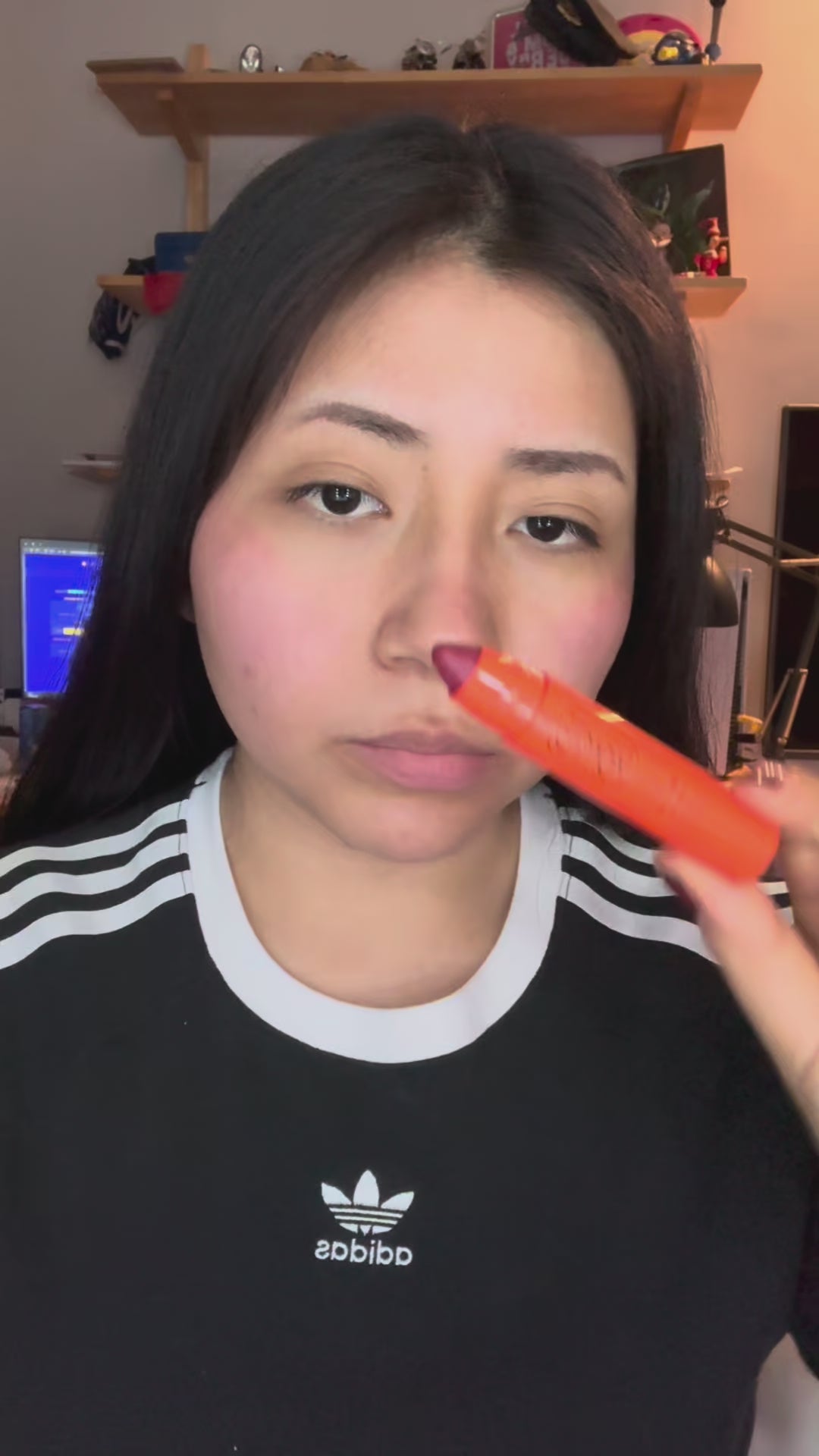 Load video: Woman applying Lip and Cheek in Rubia Rose and Lip Oil and Balm in Orchid Pink for a glossy lip finish and nourishing effect