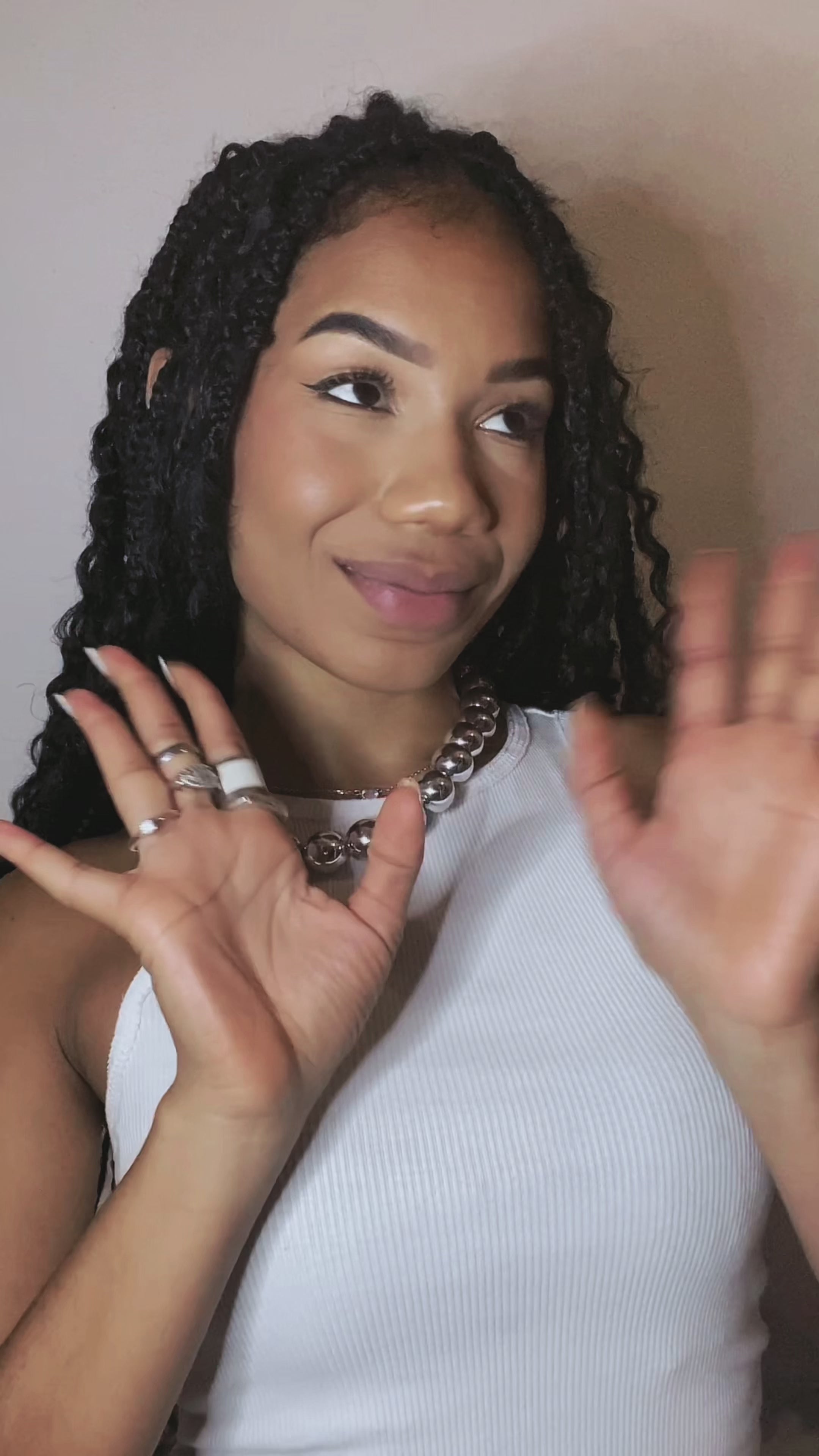 Load video: Woman applying the 2 in 1 Lebubè Lip and Cheek in Vintage Rose: natural and vegan blush on her cheeks and stick on her lips.