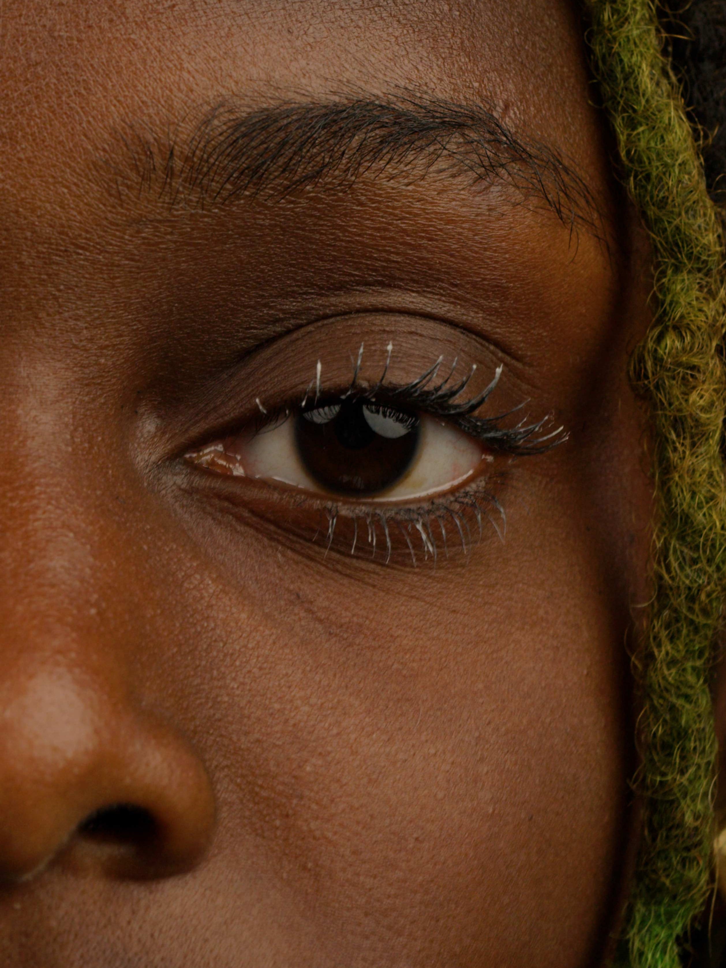 Zoom in on an eye with Lebubè natural and vegan lash growth treatment for fuller, stronger lashes and lashcare
