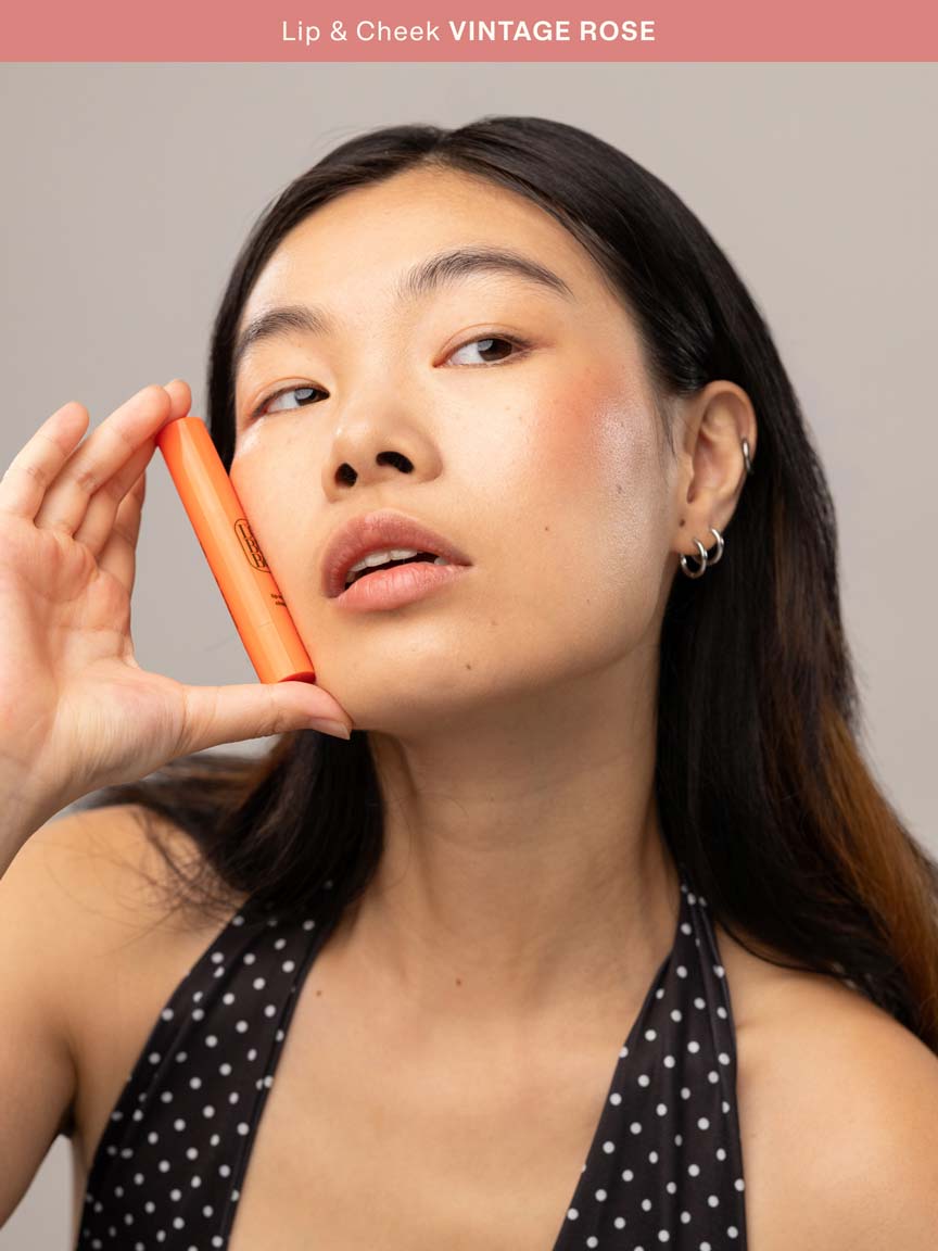 Woman wearing the 2 in 1 Lebubè Lip and Cheek in Vintage Rose: Halal, natural and vegan 2 in 1 blush and lipstick.