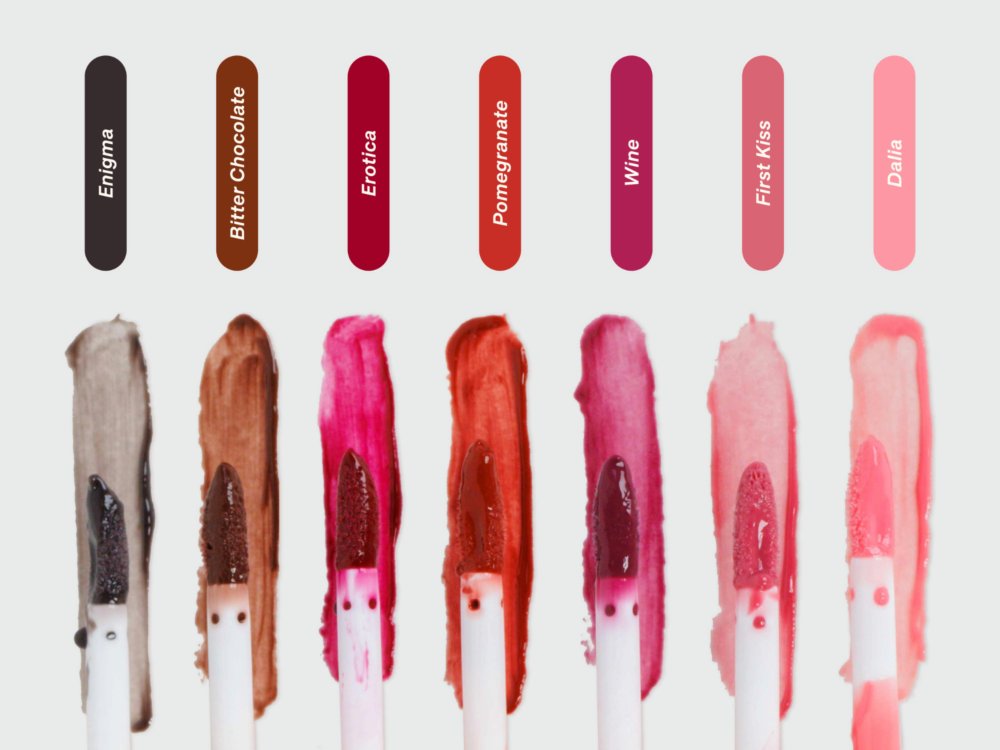 Texture swatches of all 7 Lebubè Tinted Lip Oil and Balm shades, showing how the colors appear. From Lebubè hybrid cosmetics.