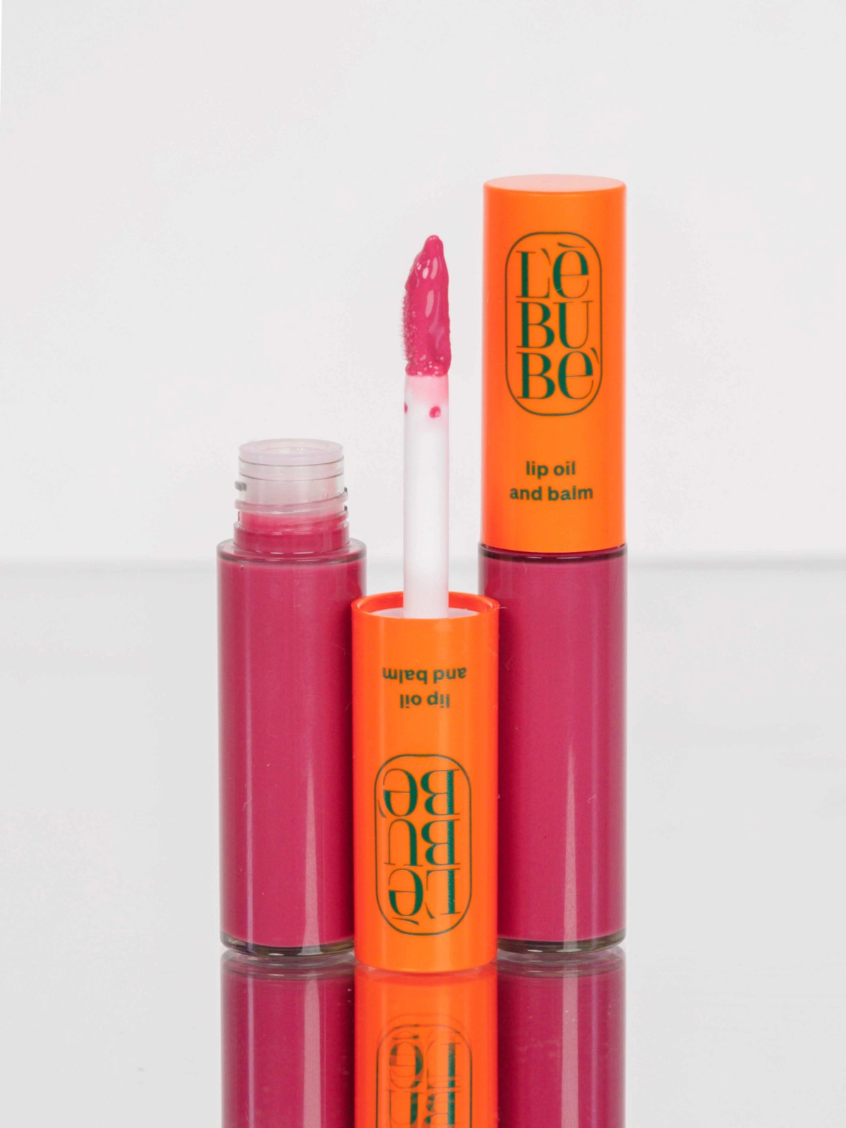 Lebubè Tinted Lip Oil and Balm: zoomed-in front view of First Kiss shade. Hydrating and vegan tinted lip treatment 