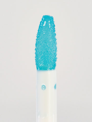 Lebubè Lip Oil and Balm Azure, extra focus front view of the brush. Vegan, hydrating and repairing lip treatment for dry lips.