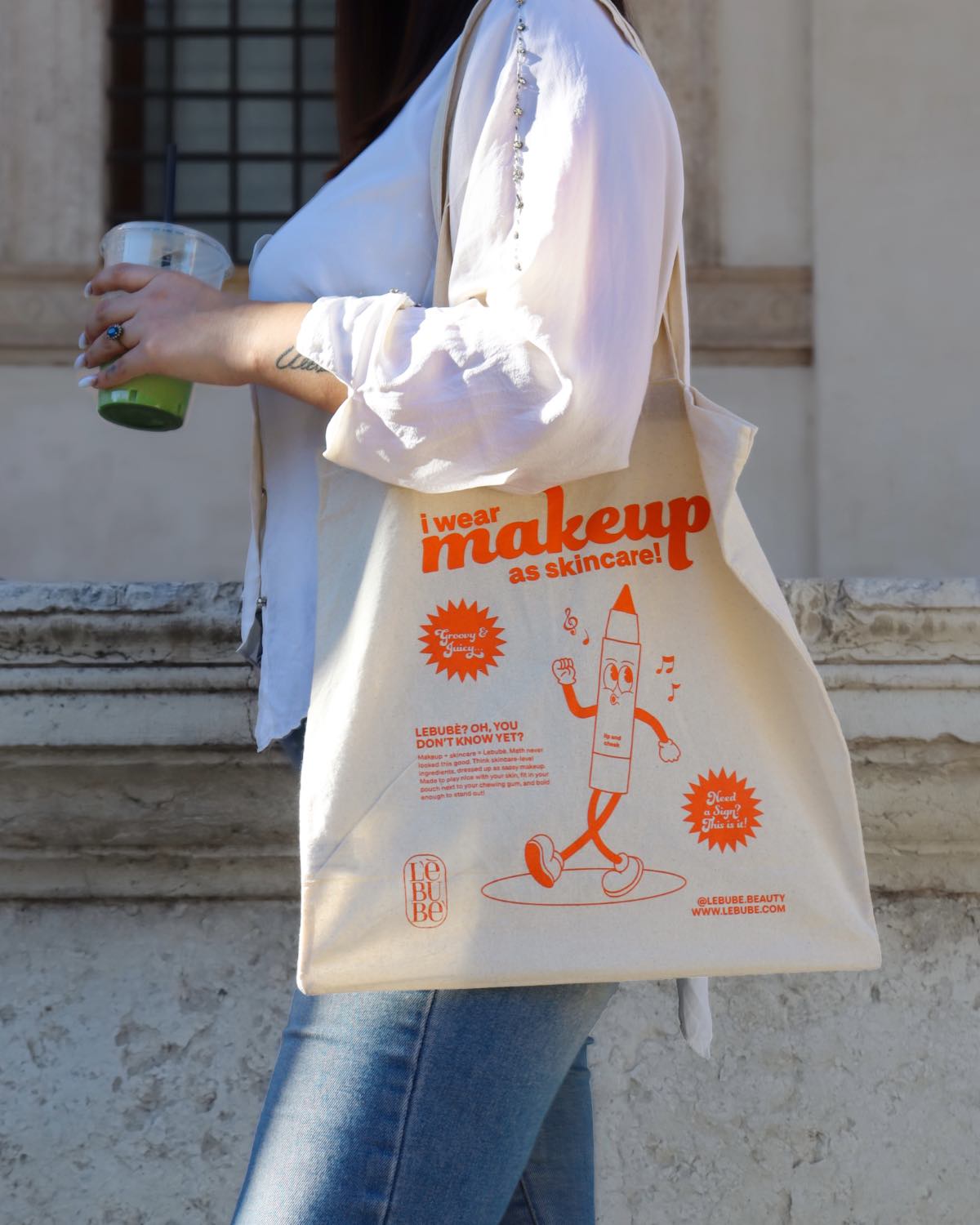 Lebubè tote bag made from 100% natural cotton, “I wear makeup as skincare” orange print