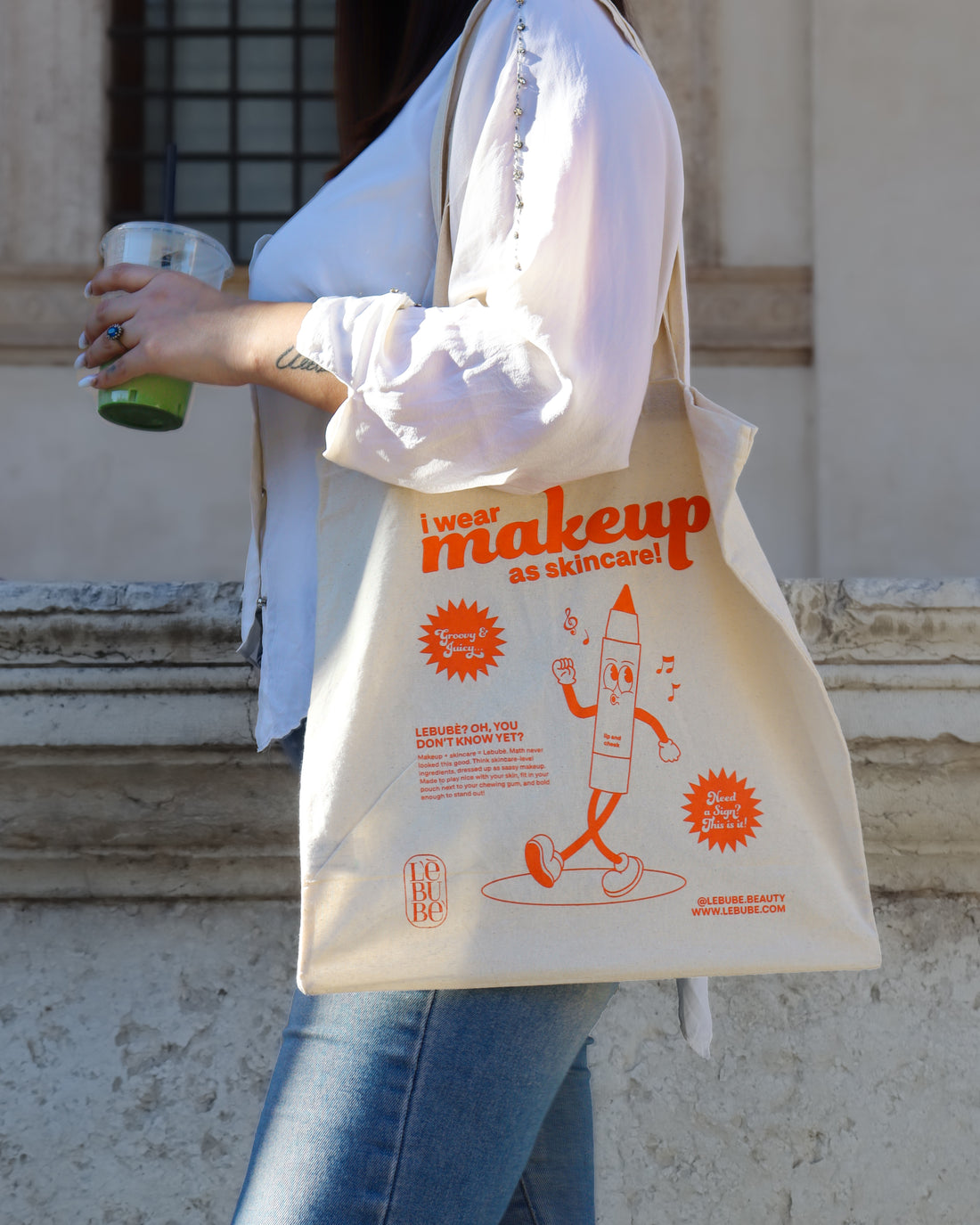 Lebubè tote bag made from 100% natural cotton, “I wear makeup as skincare” orange print