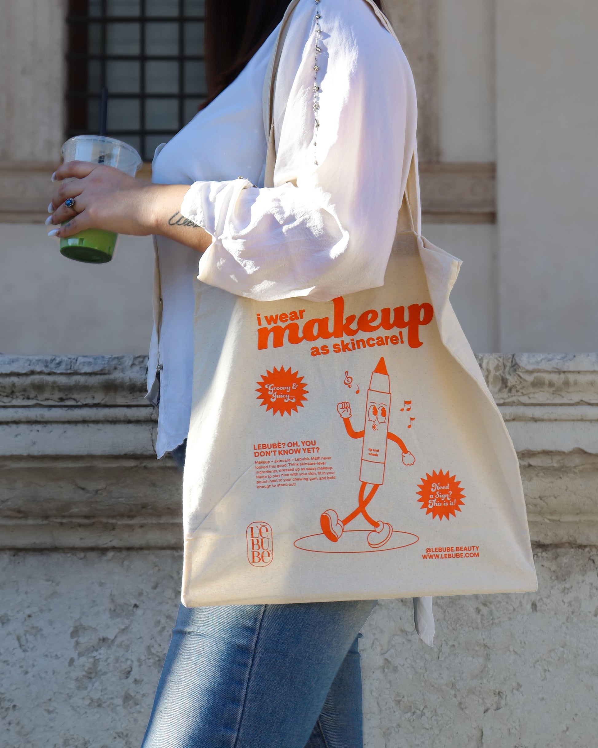 Lebubè tote bag made from 100% natural cotton, “I wear makeup as skincare” orange print