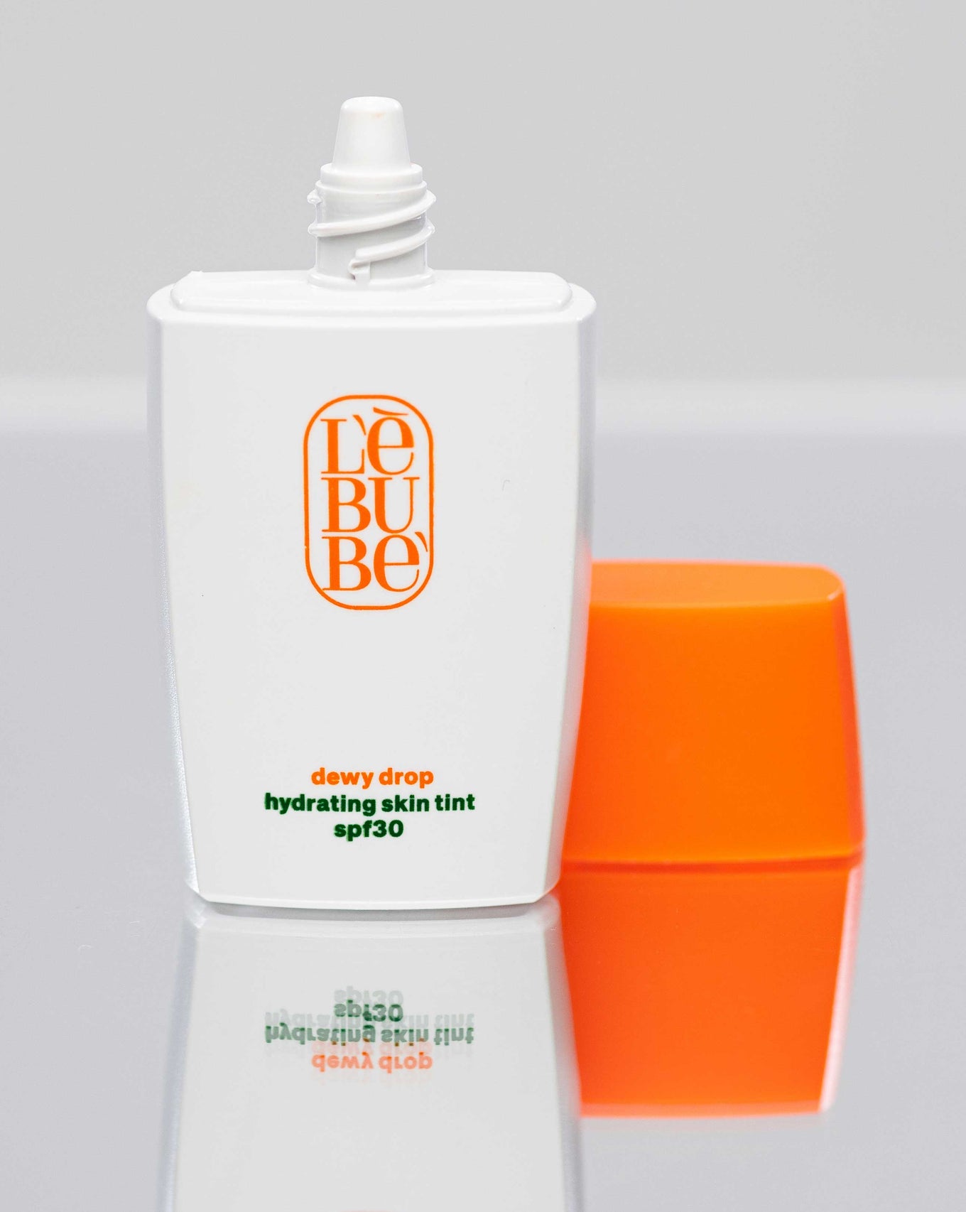 Dewy Drop Hydrating Skin Tint SPF30 open cap, Halal vegan tinted sunscreen and moisturizer with lightweight hydrating formula