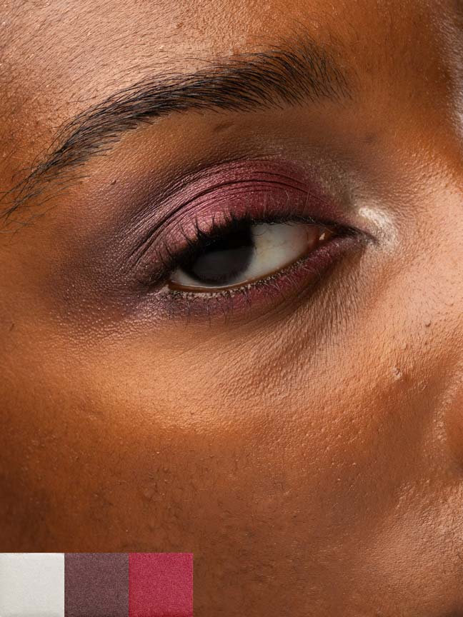 Woman wearing three DUSK long-lasting eyeshadow shades, holding the palette with cool neutral tones, talc-free and vegan