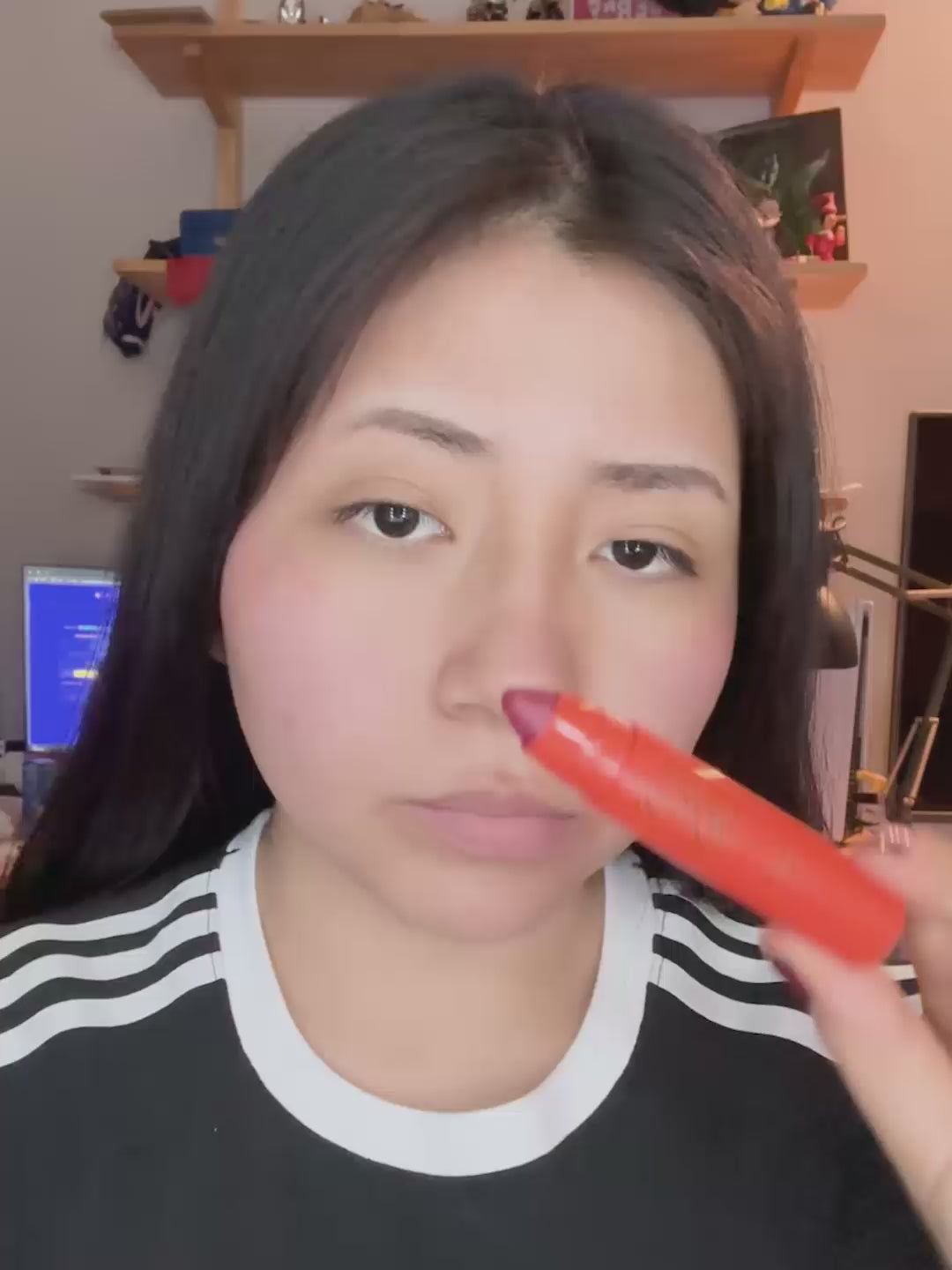 Load video: Woman applying Lip and Cheek in Rubia Rose and Lip Oil and Balm in Orchid Pink for a glossy lip finish and nourishing effect